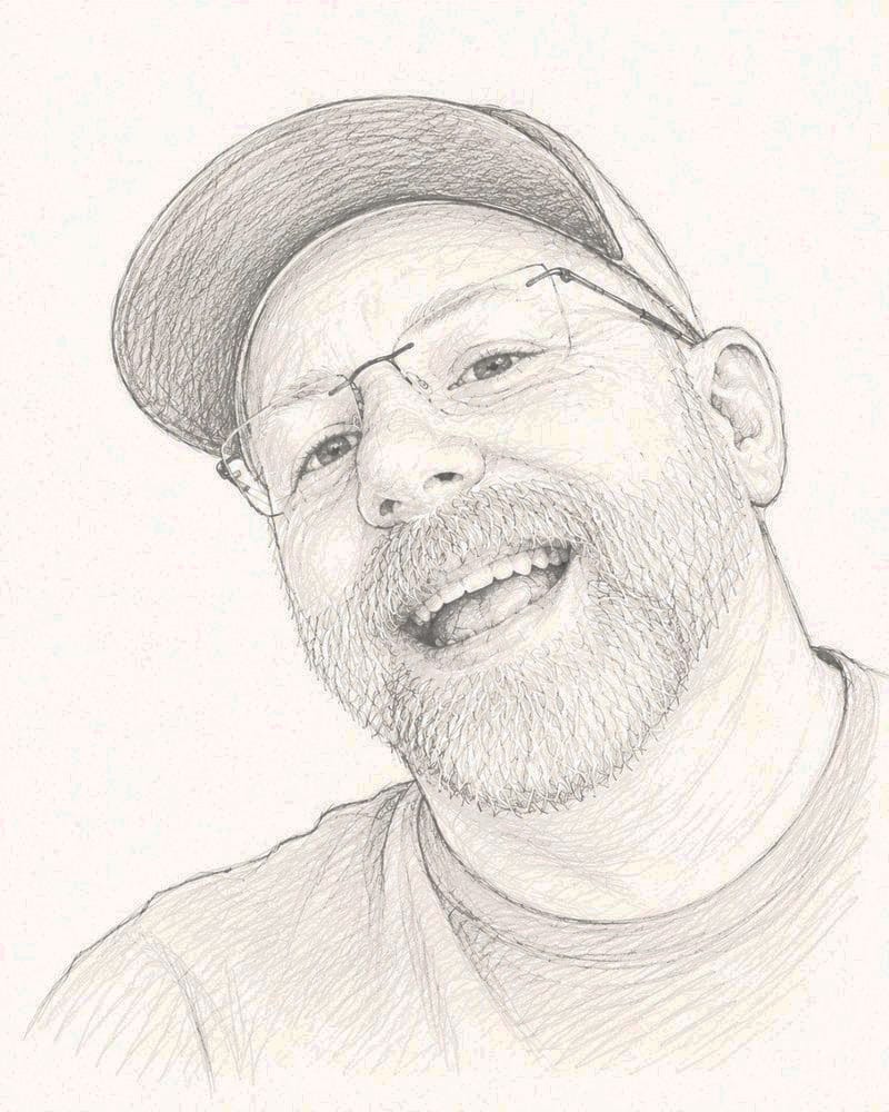 Russell Pachman, care team member at Love The Golden Rule, Inc., a non-profit medical clinic in Saint Petersburg, Florida